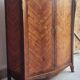 Louis XV style linen cabinet with marquetry and bronze, late 19th century.
