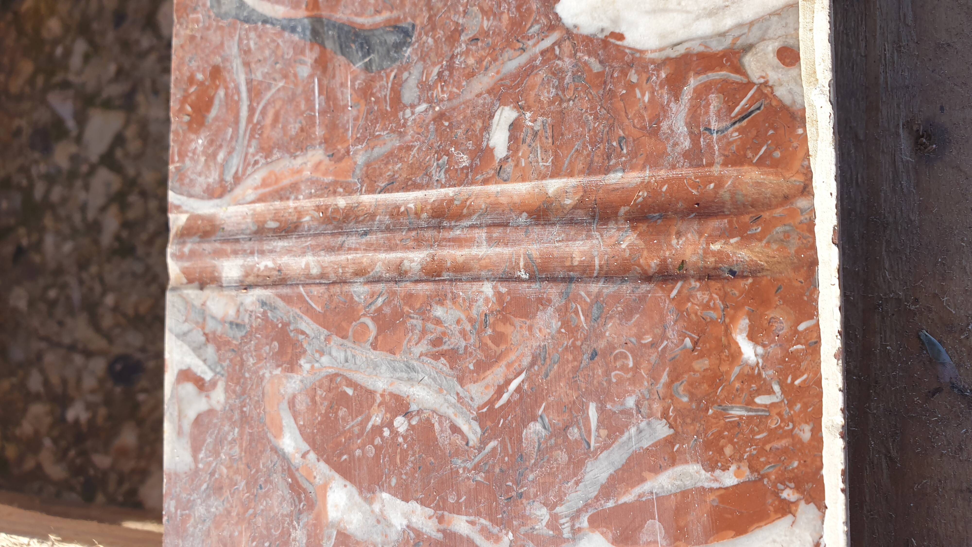 Red marble fireplace surround - early 20th century