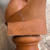 Child bust in terracotta