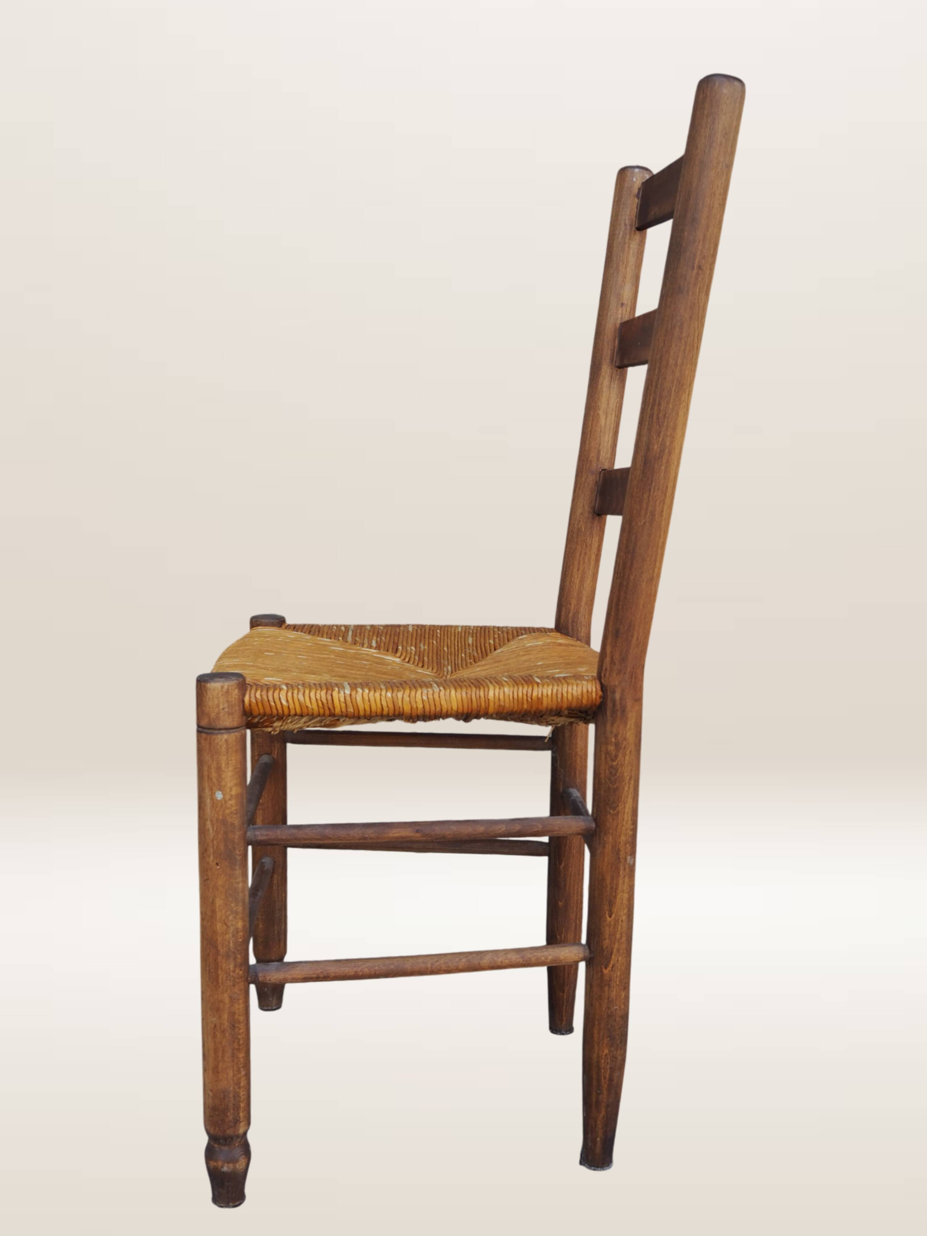 Set of six rush-seated ladderback chairs.