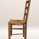 Set of six rush-seated ladderback chairs.