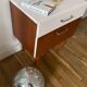 Wooden bedside table and nude