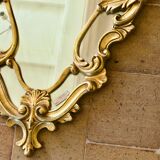 Antique Baroque mirror with gilded metal panels