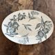 Plat ovale décor fruits en terre de fer de Grigny
