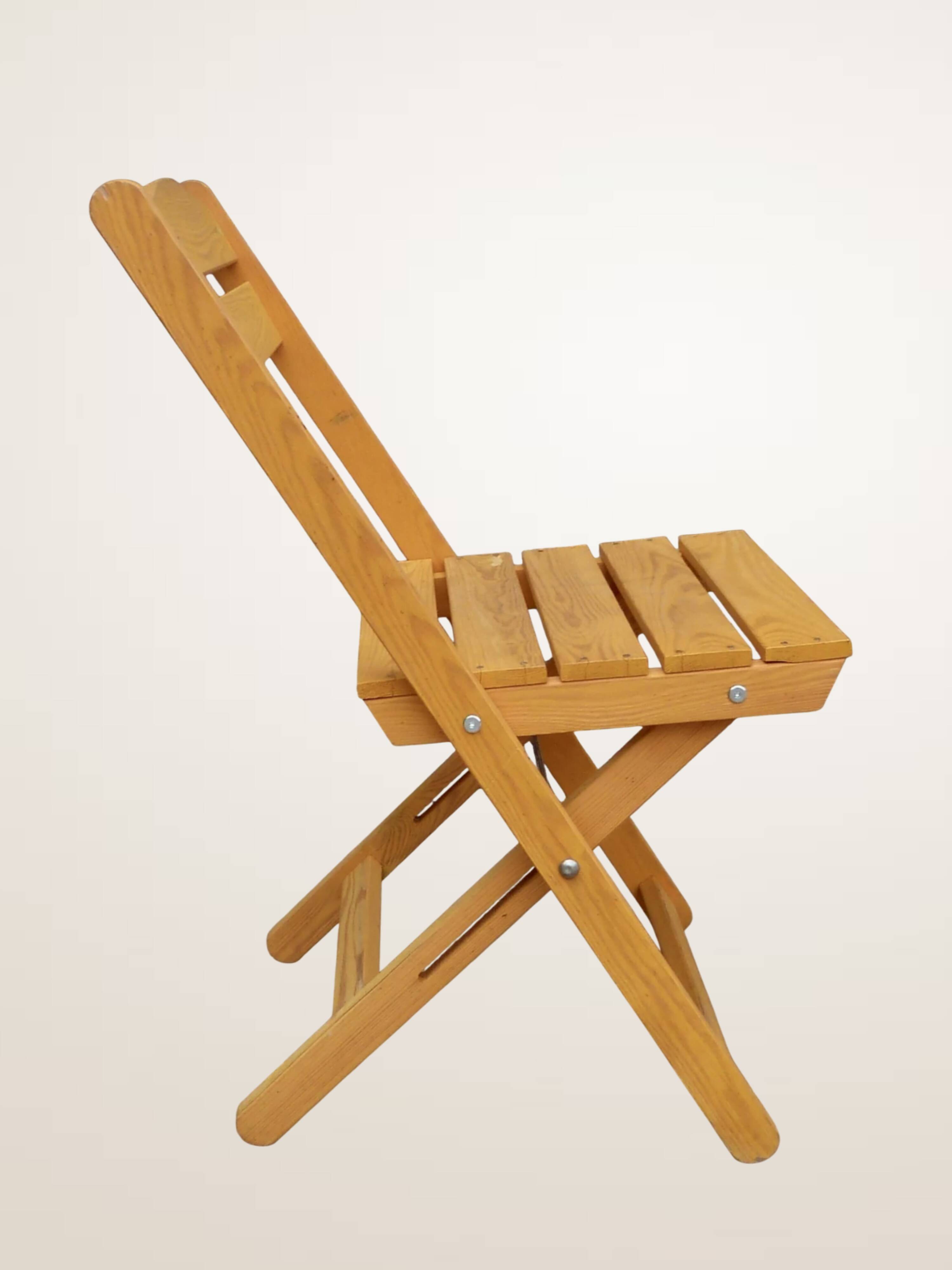 Paire de chaises pliantes en bois blond