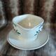 Antique sauce boat in Longchamp ironstone.