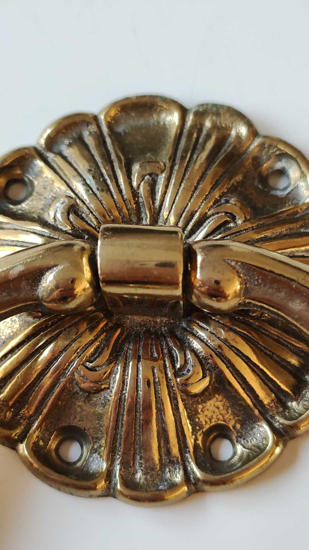 Antique door knocker/hammer of floral shape with large ring decorated with scrolls of acanthus