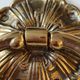 Antique door knocker/hammer of floral shape with large ring decorated with scrolls of acanthus