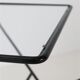 Filigree mid-century modern side table with magazine rack / steel / glass / 1960s