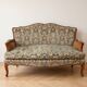 Louis XV style living room set with a sofa and 2 armchairs in cherry wood and fabric.