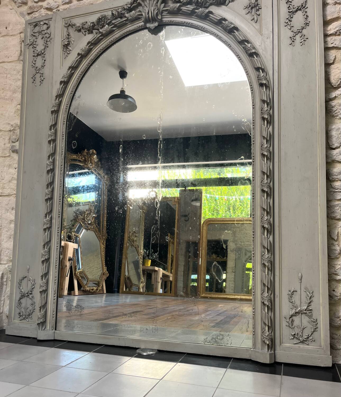 Important woodwork, 176.5cm/158cm 19th century fireplace mirror, quilted glass, parquet on the back.