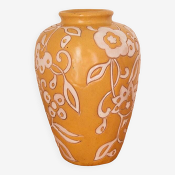 Yellow enamel vase with white flower decoration