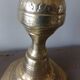 Old candle holder in gilded bronze