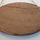 Oval mirror in wood and gilded plaster with pompom decoration