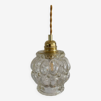 Walking lamp with vintage globe in transparent molded glass