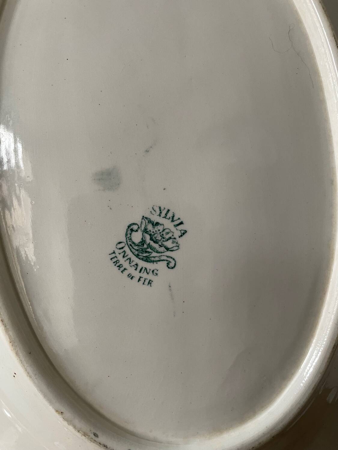 Série de plats ovales Terre de Fer 1900