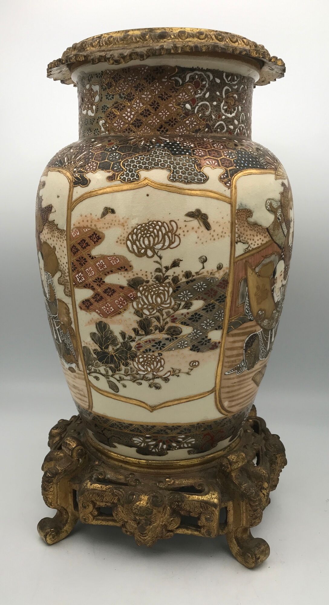 Old satsuma ceramic vase with various decorations mounted on bronze