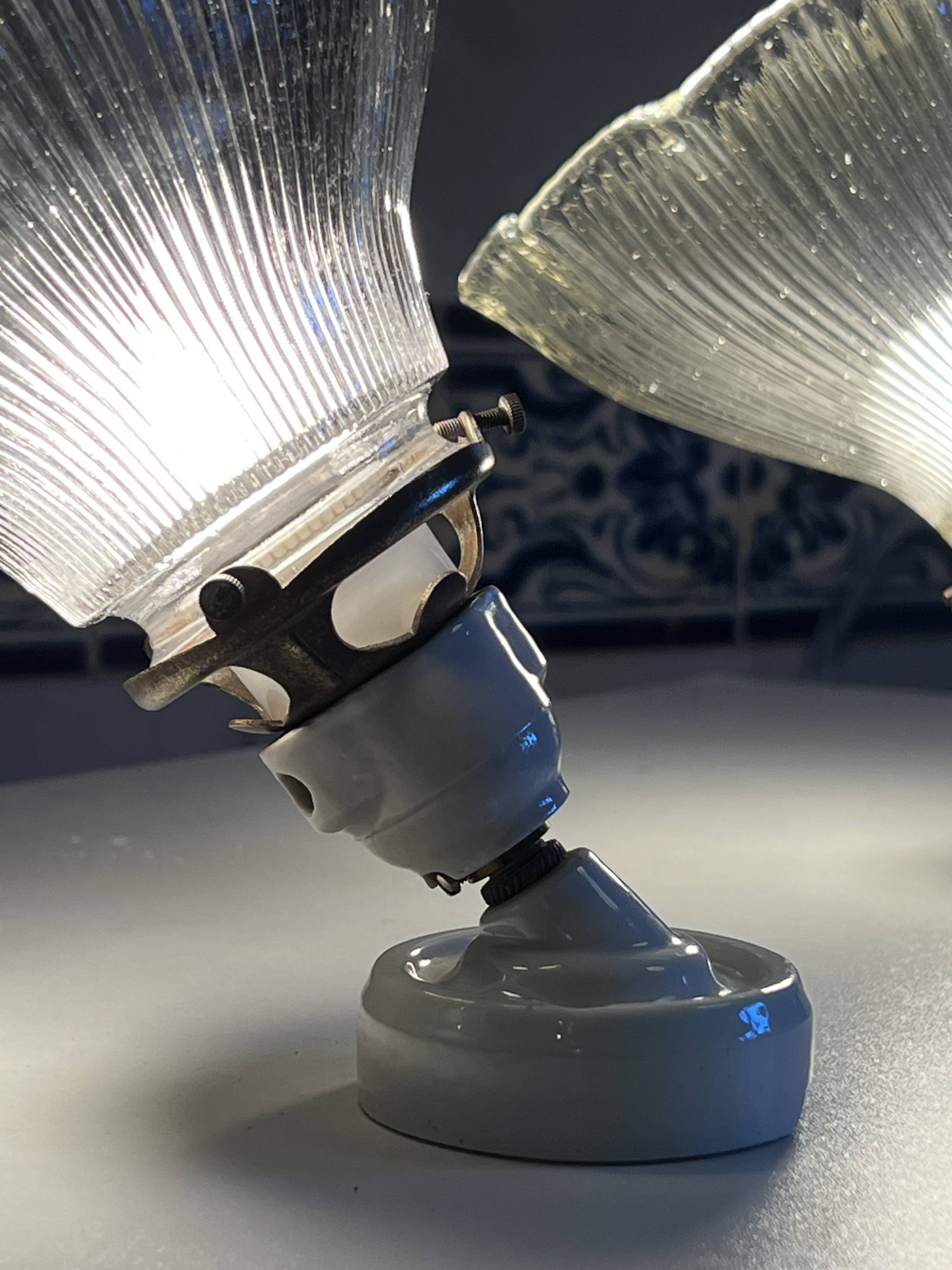 Holophane wall lights with bistro-style porcelain supports