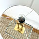 Vintage table lamp in gilded brass Hollywood Regency style.