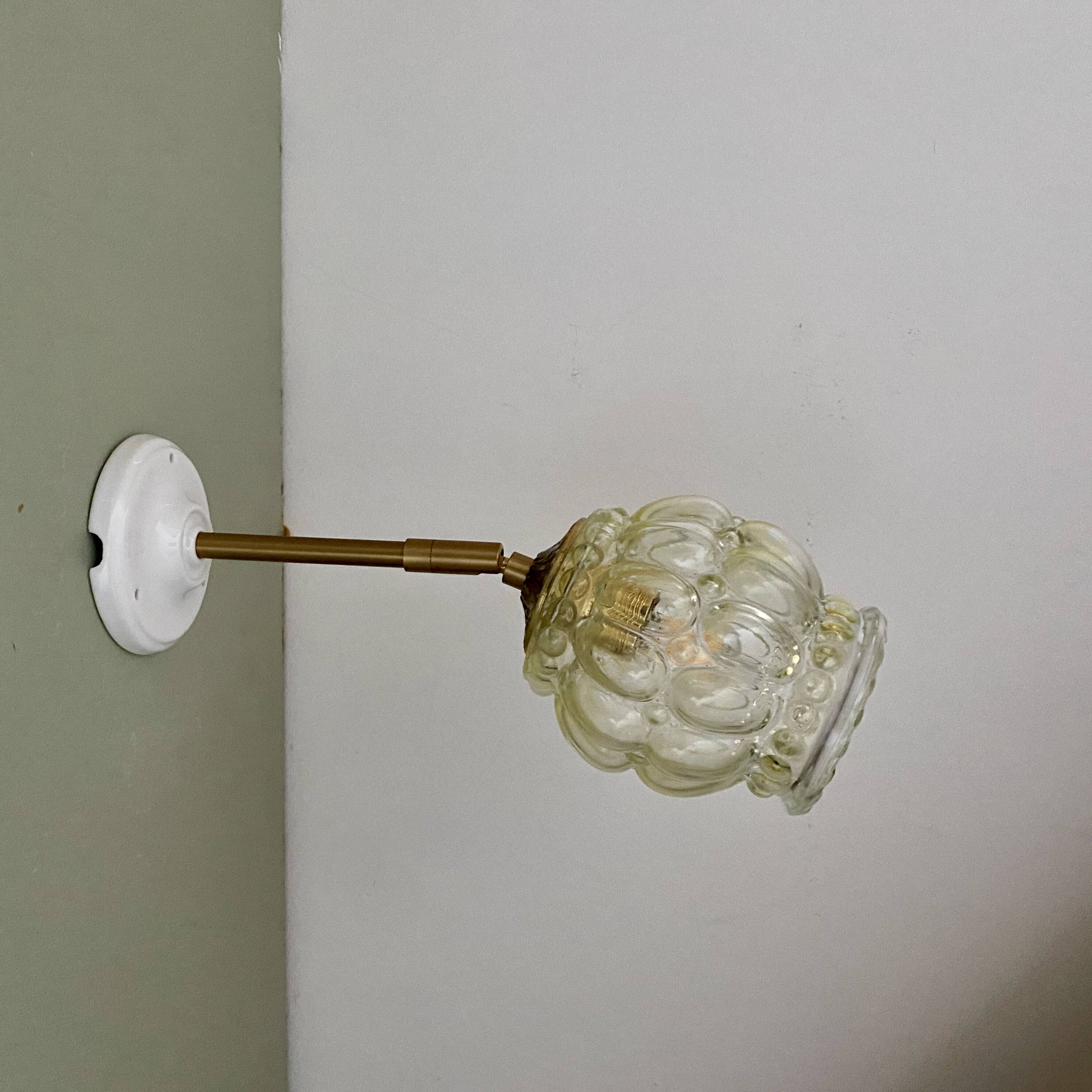 Vintage amber glass globe wall light