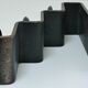 Sculptural candle holder patinated steel design 80s