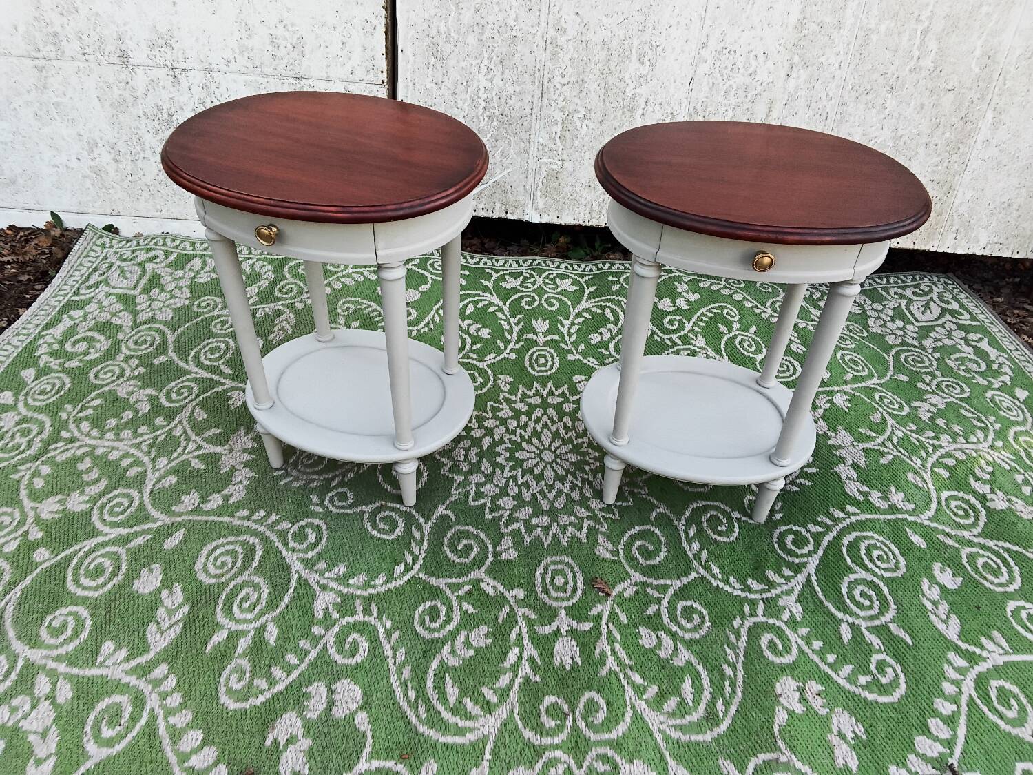 Pair of oval bedside tables