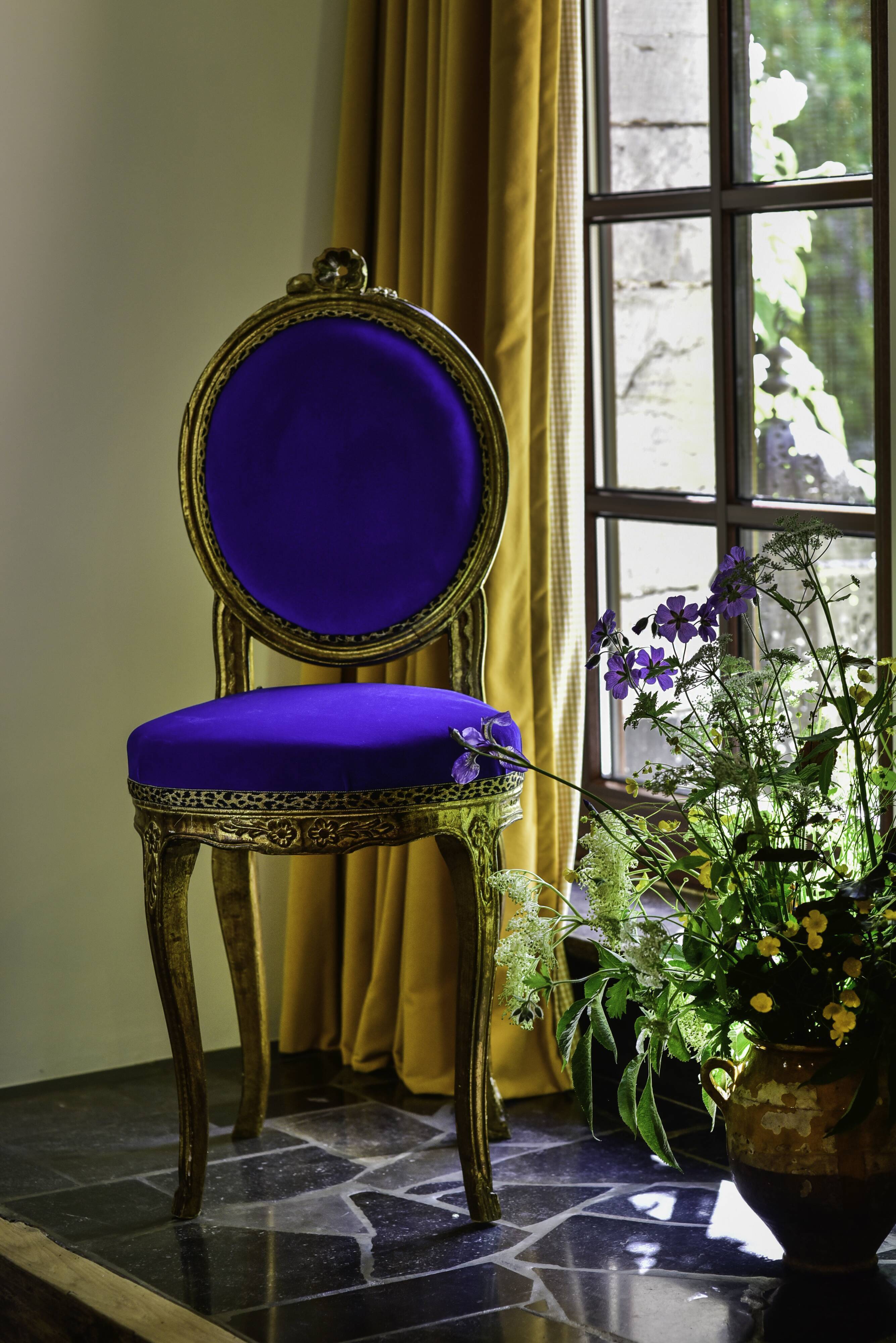 Blue velvet medallion chair