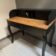 Black stepped wooden desk