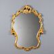 Carved and gilded wooden mirror in Barocchetto style