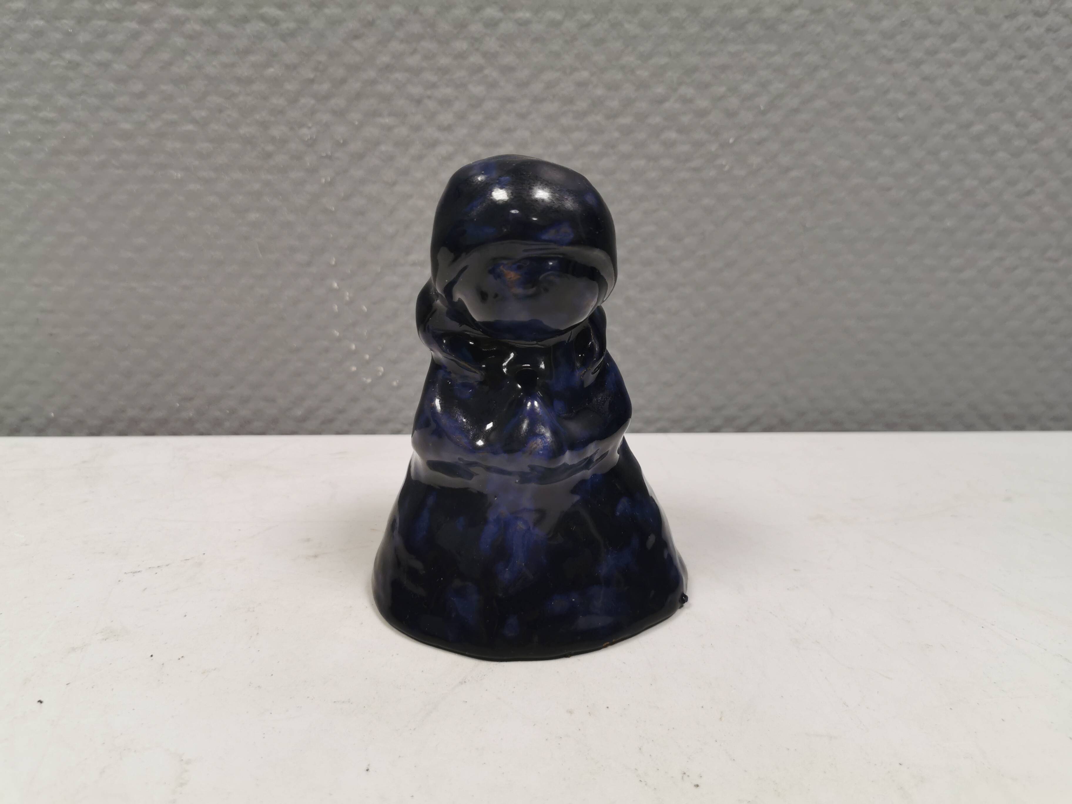 Lady figure in earthenware with shiny blue glaze