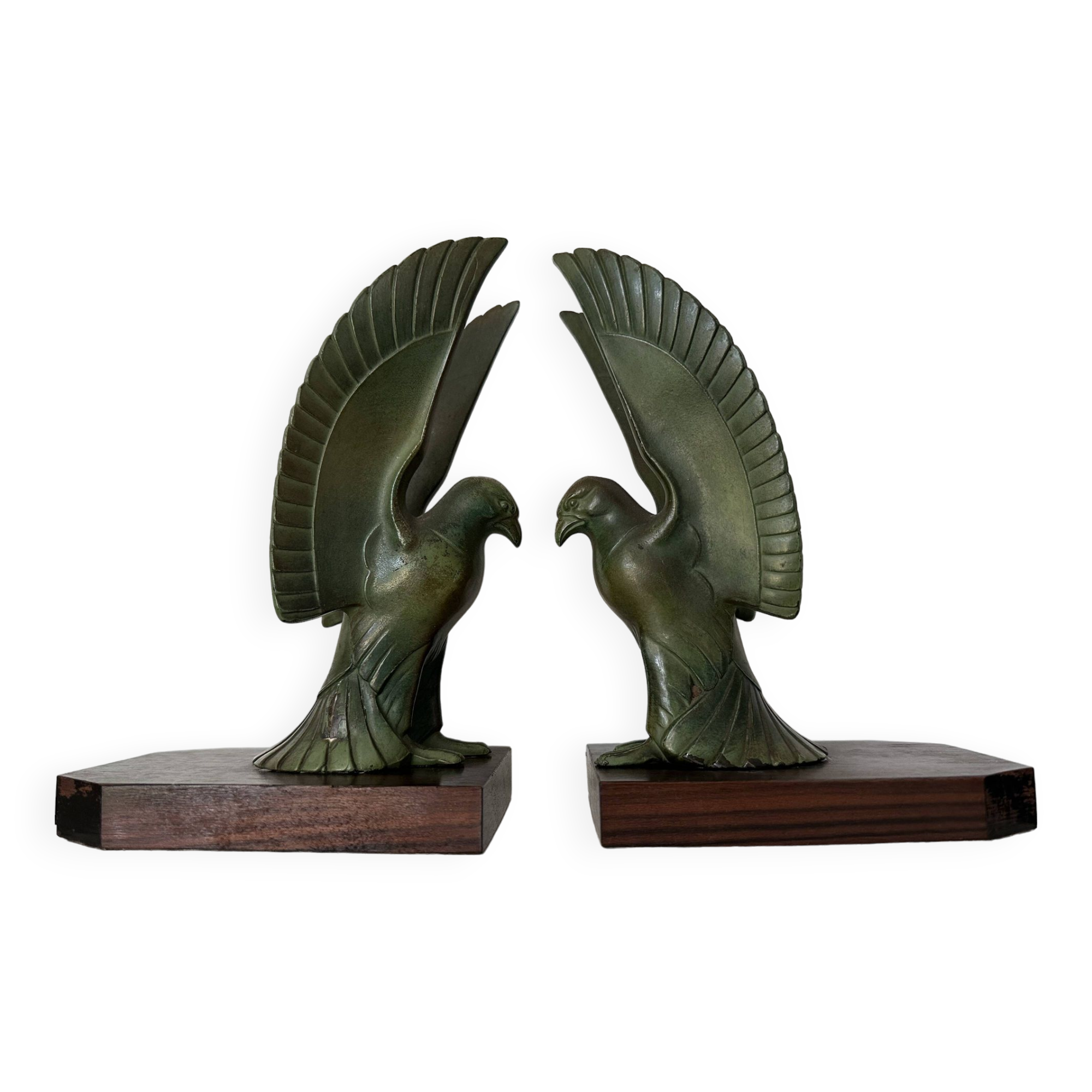 Pair of eagle bookends in green patina regula with rosewood base