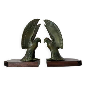 Pair of eagle bookends in green patina regula with rosewood base