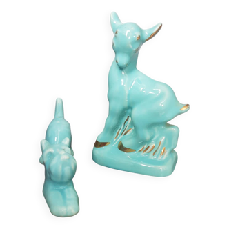 Pair of turquoise zoomorphic statuettes