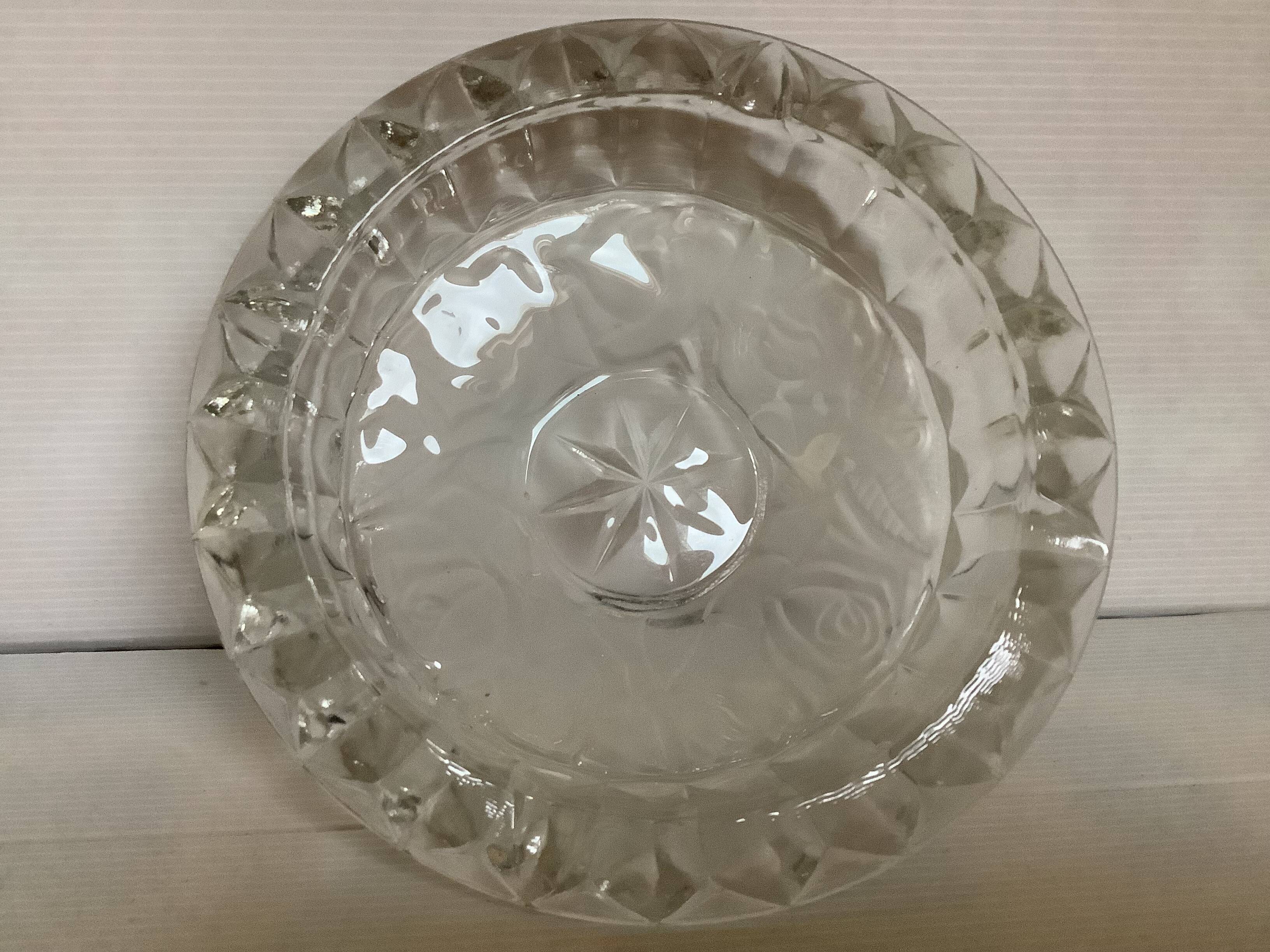 Large glass ashtray with frosted flowers.