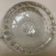 Large glass ashtray with frosted flowers.