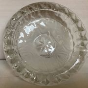 Large glass ashtray with frosted flowers.