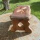 Bench in carved and varnished wood, mountain chalet decoration, old