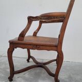 Louis XV Regency cane armchair leather armrests decorated with shell