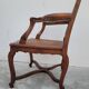 Louis XV Regency cane armchair leather armrests decorated with shell