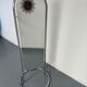 Large freestanding chrome metal full-length mirror in 1970s design.