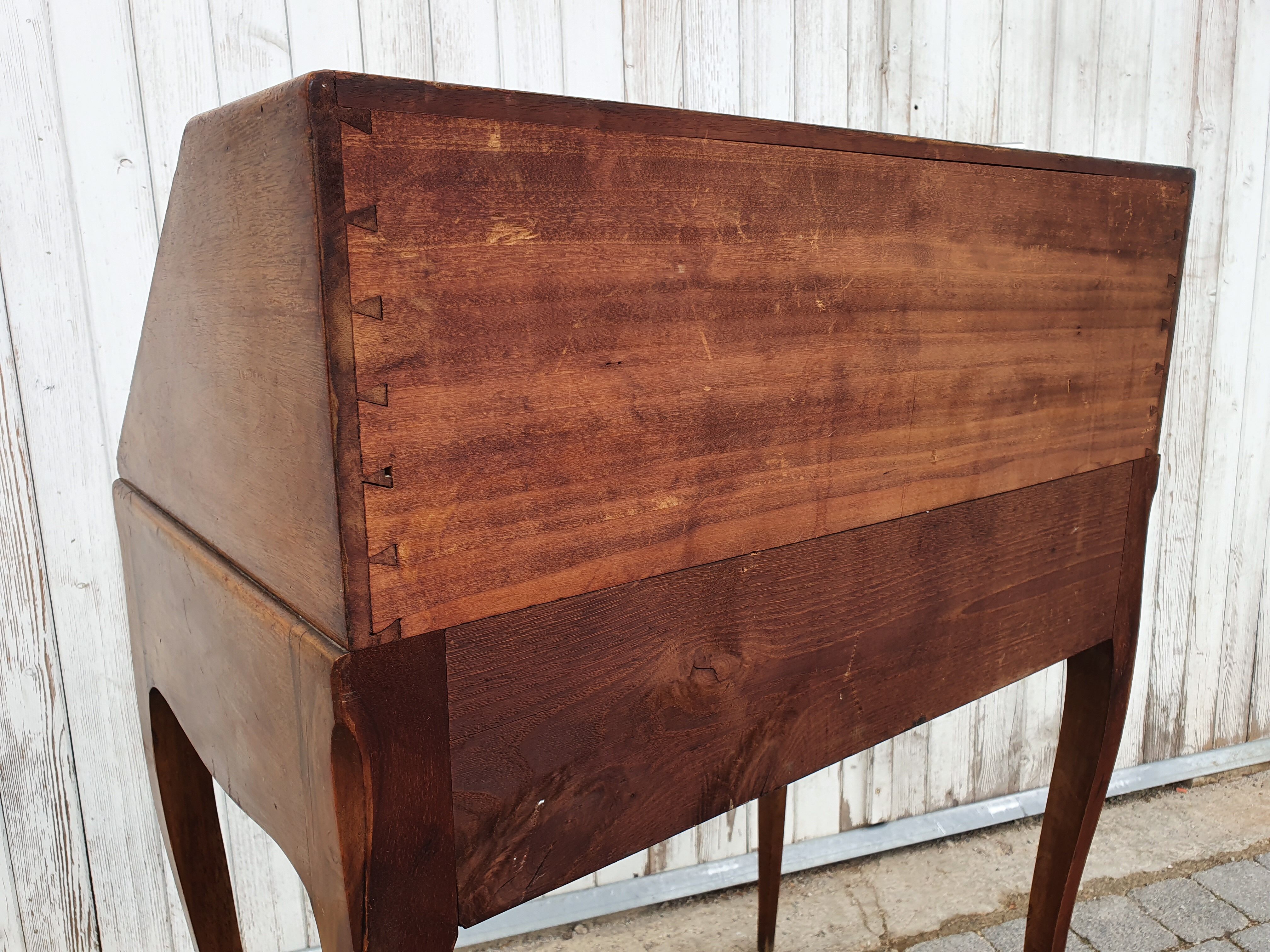 Former small secretary office with a walnut Louis XV