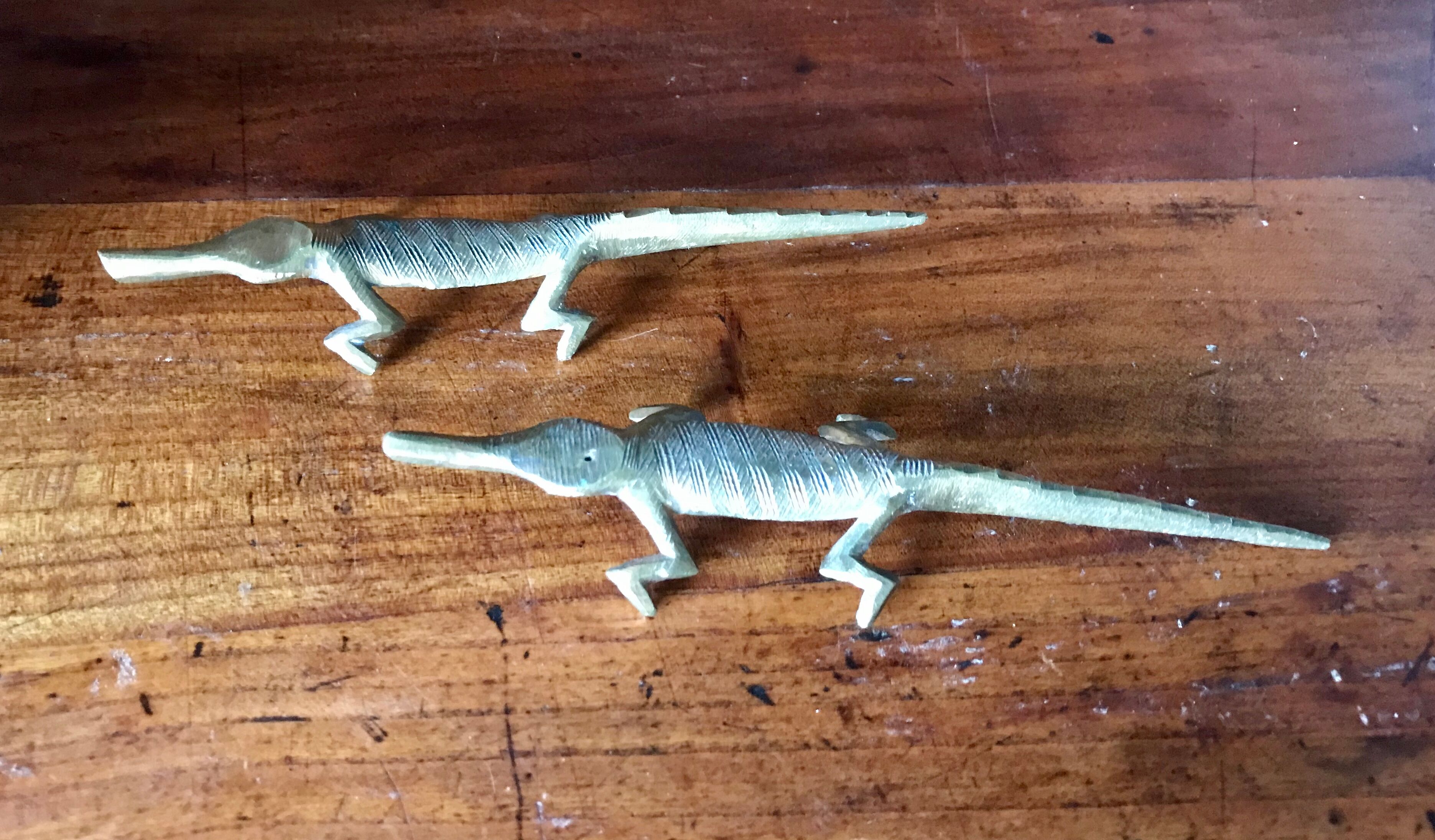 Couple of brass alligators