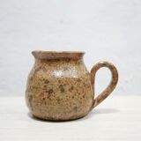 Vintage pitcher in pyrite sandstone