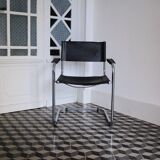Vintage chrome and faux black leather armchair