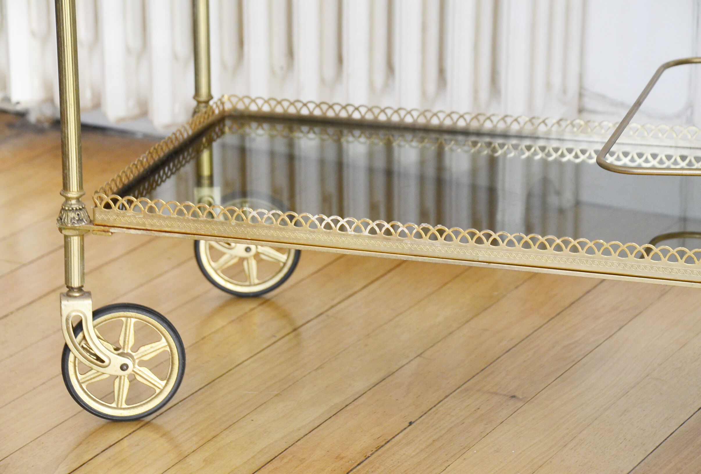 Glass and gold metal wheeled serving table 1960