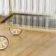 Glass and gold metal wheeled serving table 1960