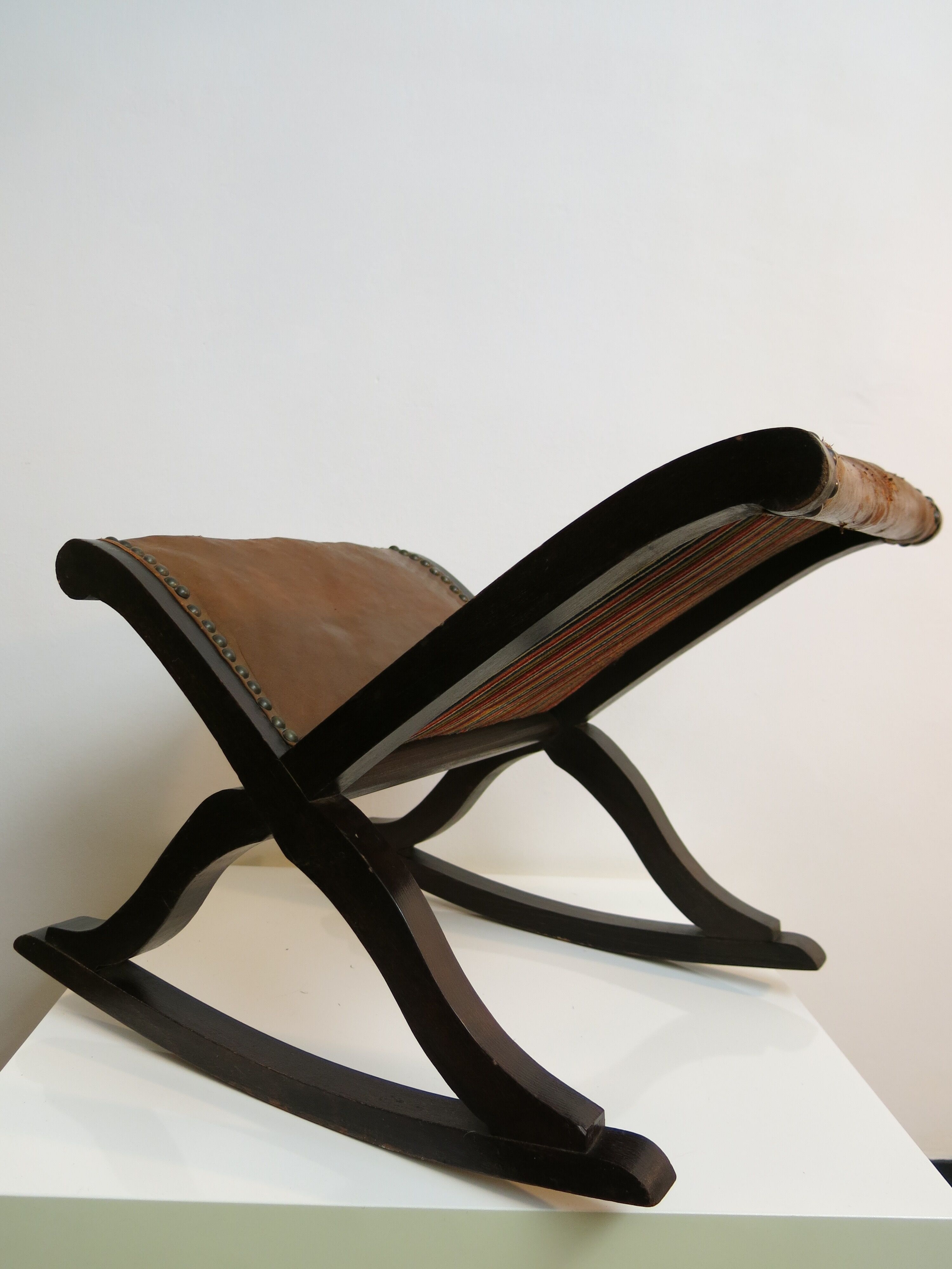 Studded leather rocking footrest