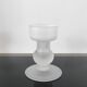 Sculptural candle holder in frosted glass.
