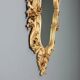 Antique lacquered and gilded wooden mirror, Italy, early 20th century.