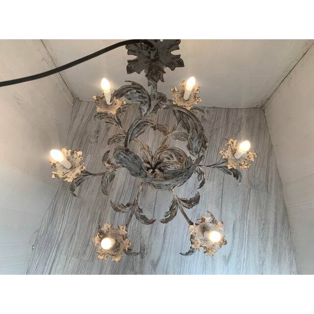 Contemporary brunish-clay florentine wrought iron leafs chandelier